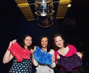 Three Grrls holding pants in the Science Museum