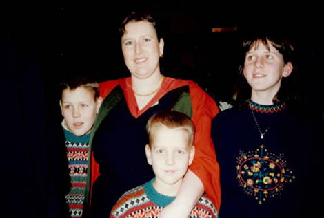 Alex's PhD graduation with her three children